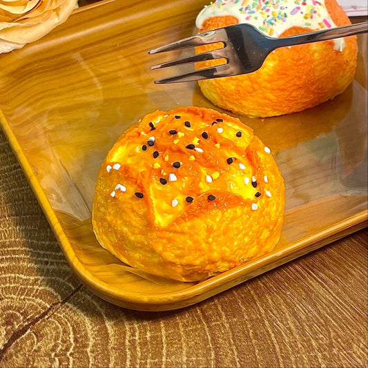 Sesame Pretzel Ball Squishy – handmade slow-rising squishy toy inspired by food, soft and cute, perfect for stress relief and sensory play.